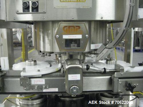 Used Genesis (West Packaging) Model RW-600LH Crimp Capper. Machine is capable of speeds up to 600 vials per minute. GMP design, gravity feed cap hopper. Vial size range: diameter 0.5-2.25", height 1....