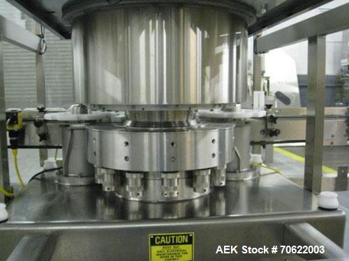 Used Genesis (West Packaging) Model RW-600LH Crimp Capper. Machine is capable of speeds up to 600 vials per minute. GMP design, gravity feed cap hopper. Vial size range: diameter 0.5-2.25", height 1....