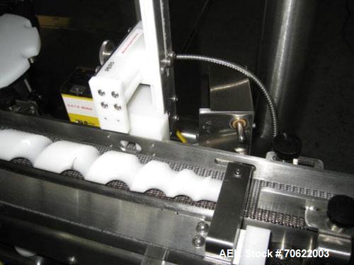 Used Genesis (West Packaging) Model RW-600LH Crimp Capper. Machine is capable of speeds up to 600 vials per minute. GMP design, gravity feed cap hopper. Vial size range: diameter 0.5-2.25", height 1....