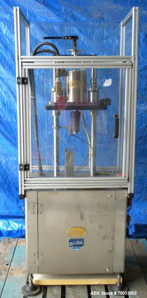 Used JG Machine Works Air Operated Inline Aerosol Crimper. Capable of 10 to 15 per minute. Capacity for 1" can valve and for vials/bottles all mm sizes. Crimps cans, glass bottles, and vials. Include...