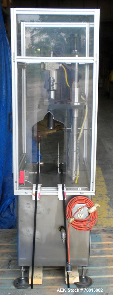 Used JG Machine Works Air Operated Inline Aerosol Crimper. Capable of 10 to 15 per minute. Capacity for 1" can valve and for vials/bottles all mm sizes. Crimps cans, glass bottles, and vials. Include...