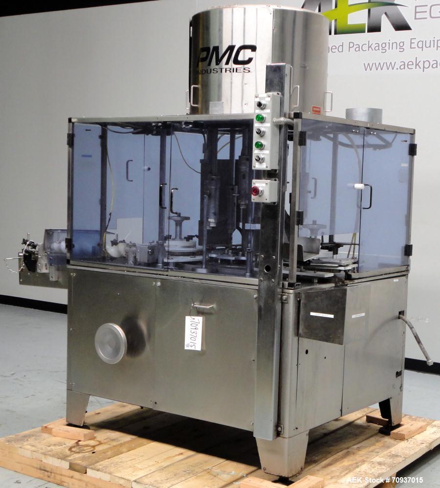Used PMC Model XRI-8000 Rotary Pump Crimper. Capable of speeds up to 120 per minute. Minimum height of container in puck 4-1/2" and maximum height of container in puck 6-1/2". 8 heads now tooled for ...