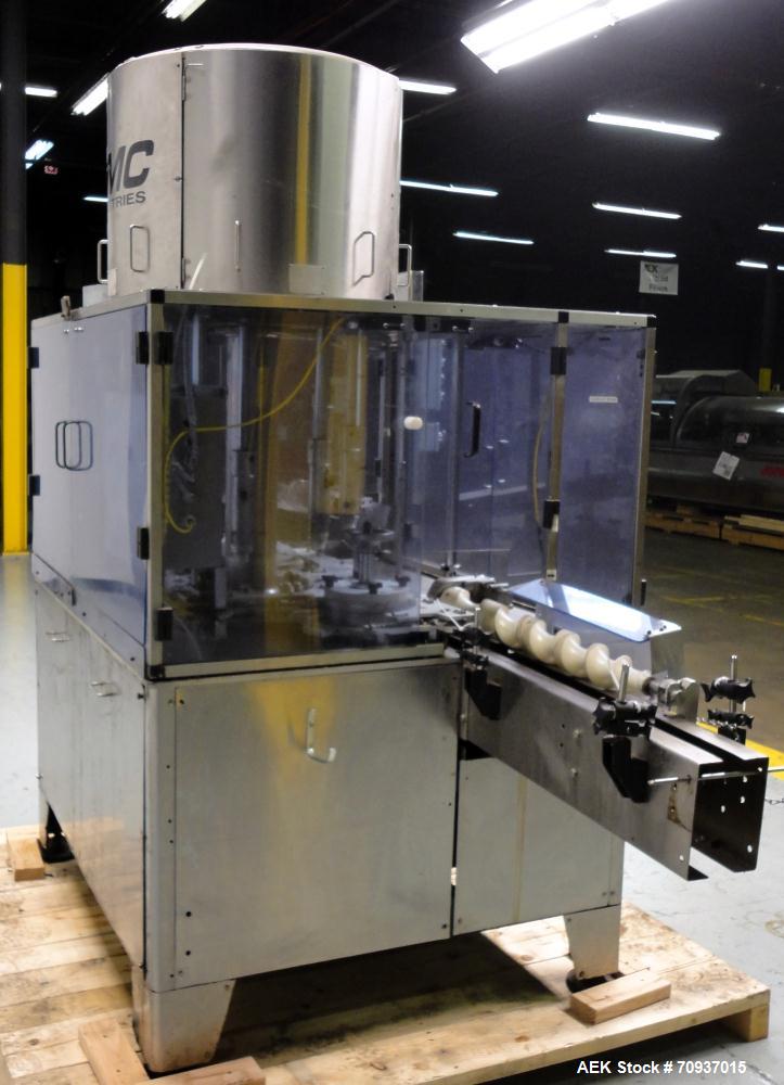Used PMC Model XRI-8000 Rotary Pump Crimper. Capable of speeds up to 120 per minute. Minimum height of container in puck 4-1/2" and maximum height of container in puck 6-1/2". 8 heads now tooled for ...