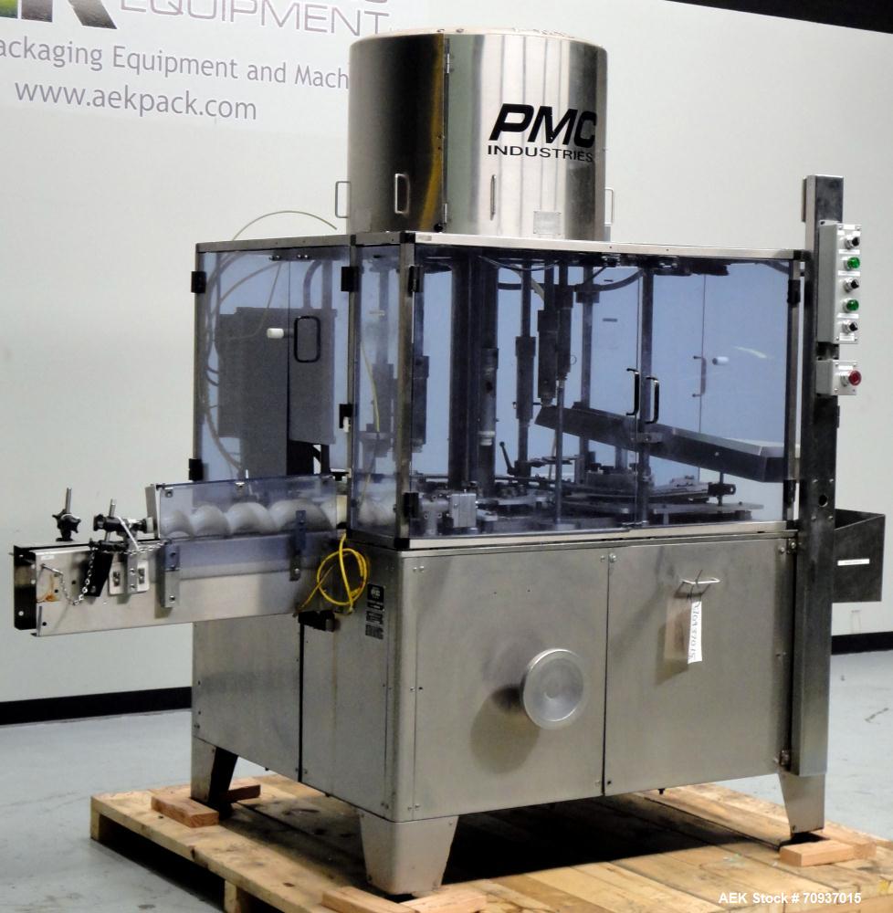 Used PMC Model XRI-8000 Rotary Pump Crimper. Capable of speeds up to 120 per minute. Minimum height of container in puck 4-1/2" and maximum height of container in puck 6-1/2". 8 heads now tooled for ...