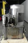 Used Nalbach Model 8 H.V.C. 8-Head Rotary Cap Crimper. Machine is capable of speeds up to 240 caps per minute. Is an 8-head crimper currently set on 25mm caps. Has worm screw to star wheel infeed. Ro...