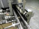 Used Nalbach Model 8 H.V.C. 8-Head Rotary Cap Crimper. Machine is capable of speeds up to 240 caps per minute. Is an 8-head crimper currently set on 25mm caps. Has worm screw to star wheel infeed. Ro...