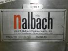 Used Nalbach Model 8 H.V.C. 8-Head Rotary Cap Crimper. Machine is capable of speeds up to 240 caps per minute. Is an 8-head crimper currently set on 25mm caps. Has worm screw to star wheel infeed. Ro...