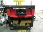 Used Nalbach Model 8 H.V.C. 8-Head Rotary Cap Crimper. Machine is capable of speeds up to 240 caps per minute. Is an 8-head crimper currently set on 25mm caps. Has worm screw to star wheel infeed. Ro...