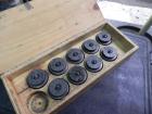 Used Nalbach Model 8 H.V.C. 8-Head Rotary Cap Crimper. Machine is capable of speeds up to 240 caps per minute. Is an 8-head crimper currently set on 25mm caps. Has worm screw to star wheel infeed. Ro...