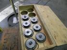 Used Nalbach Model 8 H.V.C. 8-Head Rotary Cap Crimper. Machine is capable of speeds up to 240 caps per minute. Is an 8-head crimper currently set on 25mm caps. Has worm screw to star wheel infeed. Ro...