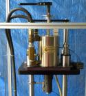 Used JG Machine Works Air Operated Inline Aerosol Crimper. Capable of 10 to 15 per minute. Capacity for 1