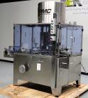 Used PMC Model XRI-8000 Rotary Pump Crimper. Capable of speeds up to 120 per minute. Minimum height of container in puck 4-1/2