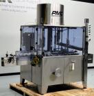 Used PMC Model XRI-8000 Rotary Pump Crimper. Capable of speeds up to 120 per minute. Minimum height of container in puck 4-1/2