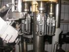 Used Alcoa 4 Head Capper. Used for MCA 28 and Stelvin 30/60 caps. Has change parts for 31.5 mm. Last used on wine bottles. 3/50/380v