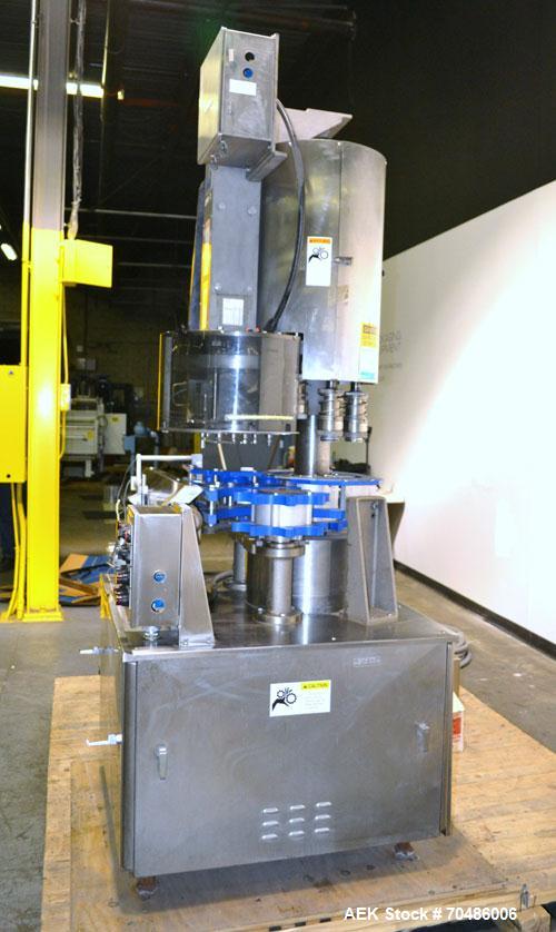 Used Alcoa Packaging Equipment 8 Head Rotary Chuck Capper, Model F-212-4. Capable of line speeds of 100 to 440/minute. Maximum container diameter 4.312’’, height 5-14’’, pitch diameter stars 12’’. Se...