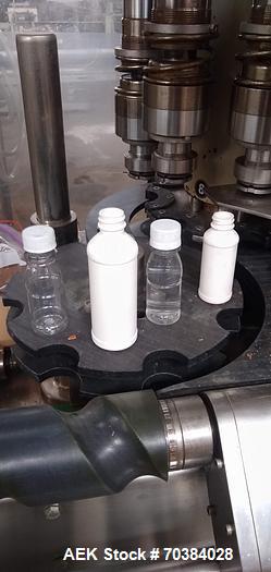 Used Biner Elison 8 Head Rotary Chuck Capper Set