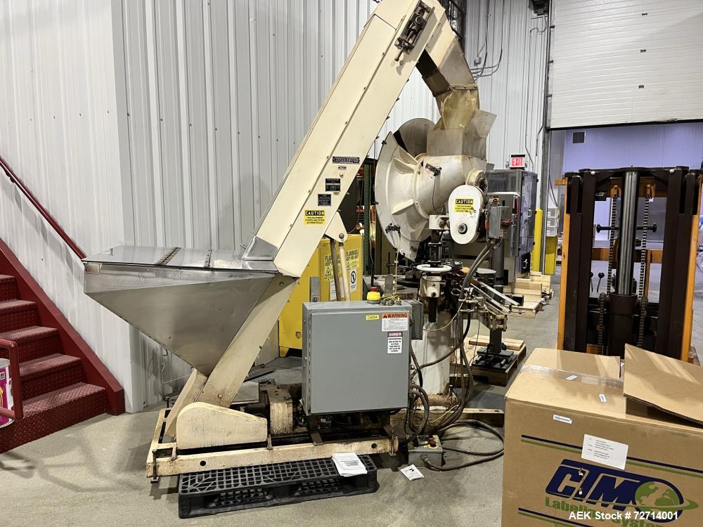 Used Consolidated C4F 4 Head Rotary Chuck Capper