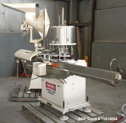 Used Consolidated-Capem 8 Head Rotary Capper, Model: D-8-FA. Capable of speeds from 20 to 175 caps per minute. Has a cap size range: 13 to 70 mm and is currently set up for a 45 mm/2” cap. Maximum co...