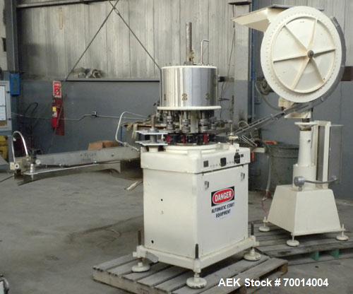 Used Consolidated-Capem 8 Head Rotary Capper, Model: D-8-FA. Capable of speeds from 20 to 175 caps per minute. Has a cap size range: 13 to 70 mm and is currently set up for a 45 mm/2” cap. Maximum co...