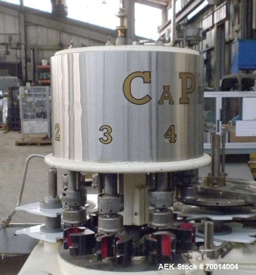 Used Consolidated-Capem 8 Head Rotary Capper, Model: D-8-FA. Capable of speeds from 20 to 175 caps per minute. Has a cap size range: 13 to 70 mm and is currently set up for a 45 mm/2” cap. Maximum co...
