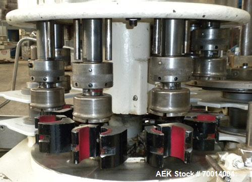 Used Consolidated-Capem 8 Head Rotary Capper, Model: D-8-FA. Capable of speeds from 20 to 175 caps per minute. Has a cap size range: 13 to 70 mm and is currently set up for a 45 mm/2” cap. Maximum co...