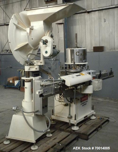 Used Consolidated-Capem 8 Head Rotary Capper, Model: D-8-FA. Capable of speeds from 20 to 175 caps per minute. Has a cap size range: 13 to 70 mm and is currently set up for a 45 mm/2” cap. Maximum co...