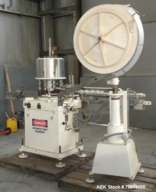 Used Consolidated-Capem 8 Head Rotary Capper, Model: D-8-FA. Capable of speeds from 20 to 175 caps per minute. Has a cap size range: 13 to 70 mm and is currently set up for a 45 mm/2” cap. Maximum co...
