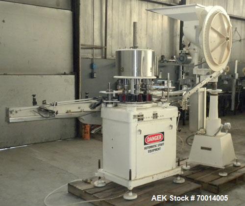 Used Consolidated-Capem 8 Head Rotary Capper, Model: D-8-FA. Capable of speeds from 20 to 175 caps per minute. Has a cap size range: 13 to 70 mm and is currently set up for a 45 mm/2” cap. Maximum co...