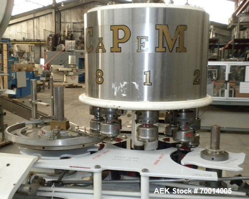 Used Consolidated-Capem 8 Head Rotary Capper, Model: D-8-FA. Capable of speeds from 20 to 175 caps per minute. Has a cap size range: 13 to 70 mm and is currently set up for a 45 mm/2” cap. Maximum co...