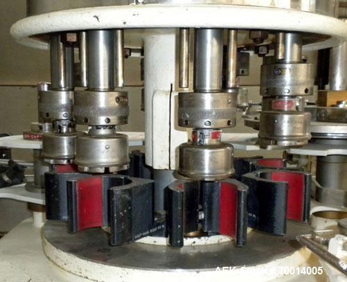 Used Consolidated-Capem 8 Head Rotary Capper, Model: D-8-FA. Capable of speeds from 20 to 175 caps per minute. Has a cap size range: 13 to 70 mm and is currently set up for a 45 mm/2” cap. Maximum co...