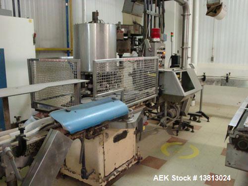 Used Capem Model TG-10 15, 10 Head Screw Capper with Sorter. Screw capper currently set up to run spice style closures in 53mm and 63mm sizes. Includes stainless steel cap sorter.