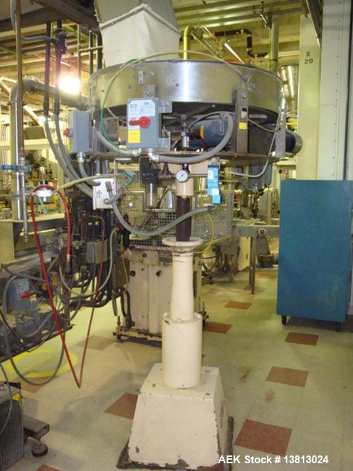 Used Capem Model TG-10 15, 10 Head Screw Capper with Sorter. Screw capper currently set up to run spice style closures in 53mm and 63mm sizes. Includes stainless steel cap sorter.
