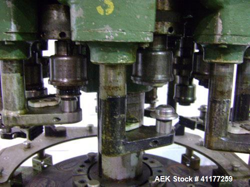 Used Consolidated Rotary Capper, Model TG-10-15. Capable of speeds up to 375 BPM. Has a Consolidated model F36 cap sorter. Cap size range: 13 - 70 mm (with proper change parts). Currently set up for ...