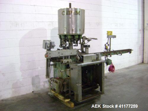 Used Consolidated Rotary Capper, Model TG-10-15. Capable of speeds up to 375 BPM. Has a Consolidated model F36 cap sorter. Cap size range: 13 - 70 mm (with proper change parts). Currently set up for ...