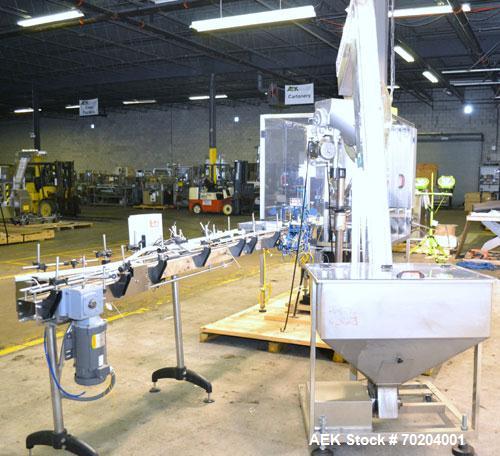 Used Consolidated Model TG-10-15 Rotary Capper. Capable of speeds up to 375 BPM. Has a Consolidated model F30 pin dial cap sorter with floor level cap feeder and worm to star container handling. Cap ...