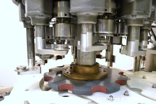 Used Consolidated Model TG-10-15 Rotary Capper. Capable of speeds up to 375 BPM. Has a Consolidated model F30 pin dial cap sorter with floor level cap feeder and worm to star container handling. Cap ...
