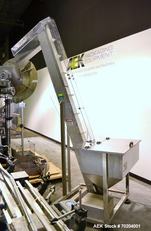 Used Consolidated Model TG-10-15 Rotary Capper. Capable of speeds up to 375 BPM. Has a Consolidated model F30 pin dial cap sorter with floor level cap feeder and worm to star container handling. Cap ...