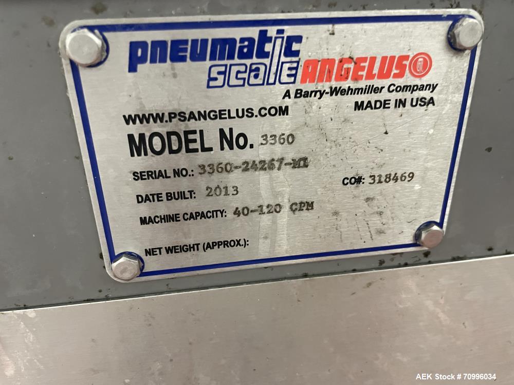 Pneutmatic Scale Model TC-600-8 Capper with Sorter Set up on 100mm Diam Caps.