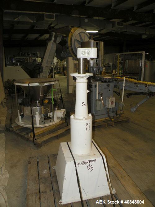 Used Consolidated TG-6-15 Rotary Chuck Capper. Capable of speeds up to 75-150 cpm. Currently set up for 24mm caps. Includes (1) Consolidated vertical sorter, model F30, driven by a 3/4 hp, 3/60/208-2...