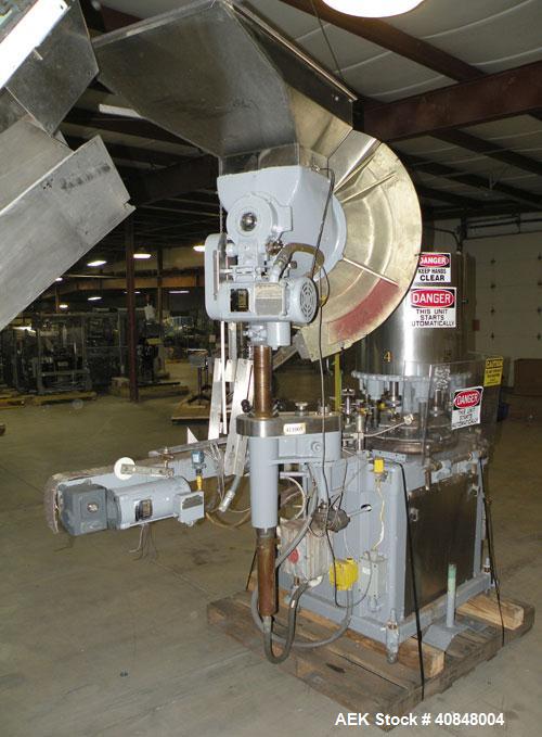 Used Consolidated TG-6-15 Rotary Chuck Capper. Capable of speeds up to 75-150 cpm. Currently set up for 24mm caps. Includes (1) Consolidated vertical sorter, model F30, driven by a 3/4 hp, 3/60/208-2...