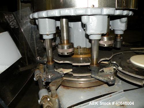 Used Consolidated TG-6-15 Rotary Chuck Capper. Capable of speeds up to 75-150 cpm. Currently set up for 24mm caps. Includes (1) Consolidated vertical sorter, model F30, driven by a 3/4 hp, 3/60/208-2...