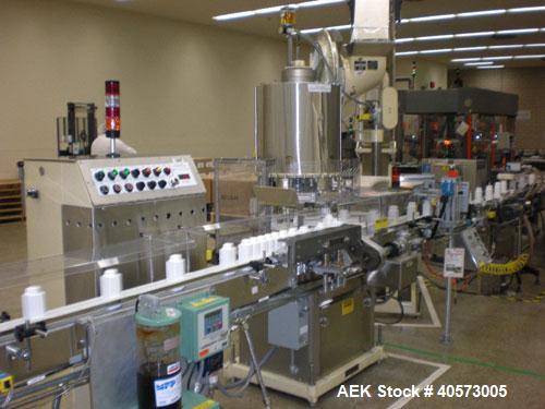 Used Consolidated TG 6-15 Rotary Chuck Capper capable of speeds up to 225 CPM. Includes pin sorter, 10' long table top chain conveyor and controls. Has wormscrew to
starwheel container handling. Chan...