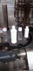 Used Biner Elison 8 Head Rotary Chuck Capper Set