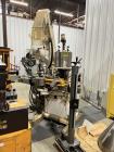 Used-Consolidated C4F 4 Head Rotary Chuck Capper