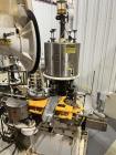 Used Consolidated C4F 4 Head Rotary Chuck Capper