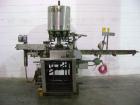 Used Consolidated Rotary Capper, Model TG-10-15. Capable of speeds up to 375 BPM. Has a Consolidated model F36 cap sorter. Cap size range: 13 - 70 mm (with proper change parts). Currently set up for ...