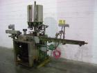 Used Consolidated Rotary Capper, Model TG-10-15. Capable of speeds up to 375 BPM. Has a Consolidated model F36 cap sorter. Cap size range: 13 - 70 mm (with proper change parts). Currently set up for ...