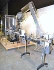 Used Consolidated Model TG-10-15 Rotary Capper. Capable of speeds up to 375 BPM. Has a Consolidated model F30 pin dial cap sorter with floor level cap feeder and worm to star container handling. Cap ...