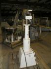 Used Consolidated TG-6-15 Rotary Chuck Capper. Capable of speeds up to 75-150 cpm. Currently set up for 24mm caps. Includes (1) Consolidated vertical sorter, model F30, driven by a 3/4 hp, 3/60/208-2...