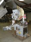 Used Consolidated TG-6-15 Rotary Chuck Capper. Capable of speeds up to 75-150 cpm. Currently set up for 24mm caps. Includes (1) Consolidated vertical sorter, model F30, driven by a 3/4 hp, 3/60/208-2...